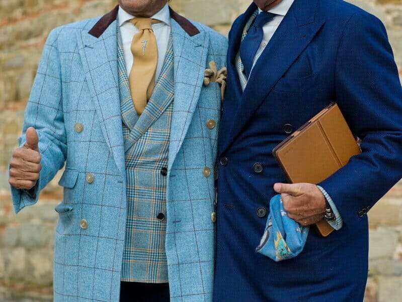 Lino Ieluzzi and Renato Plutino show the possibilities of coordinating layers with open and closed overcoats.