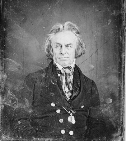 A mid 19th century photograph of a man in period clothes