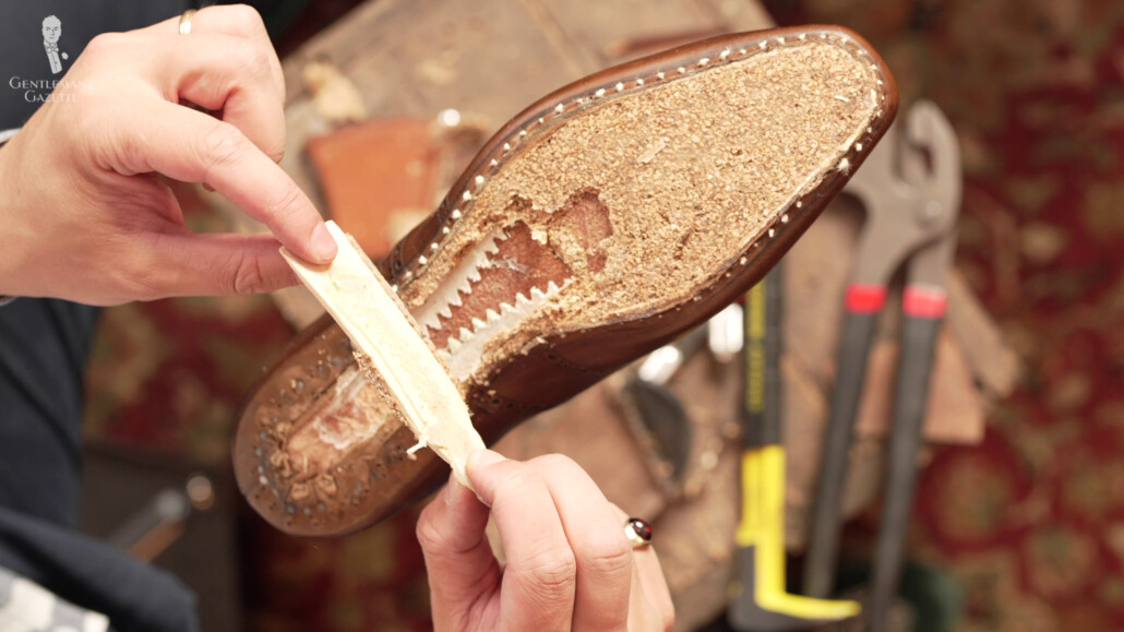 The wooden shank found between the cork layer and the oak tanned leather outsole.
