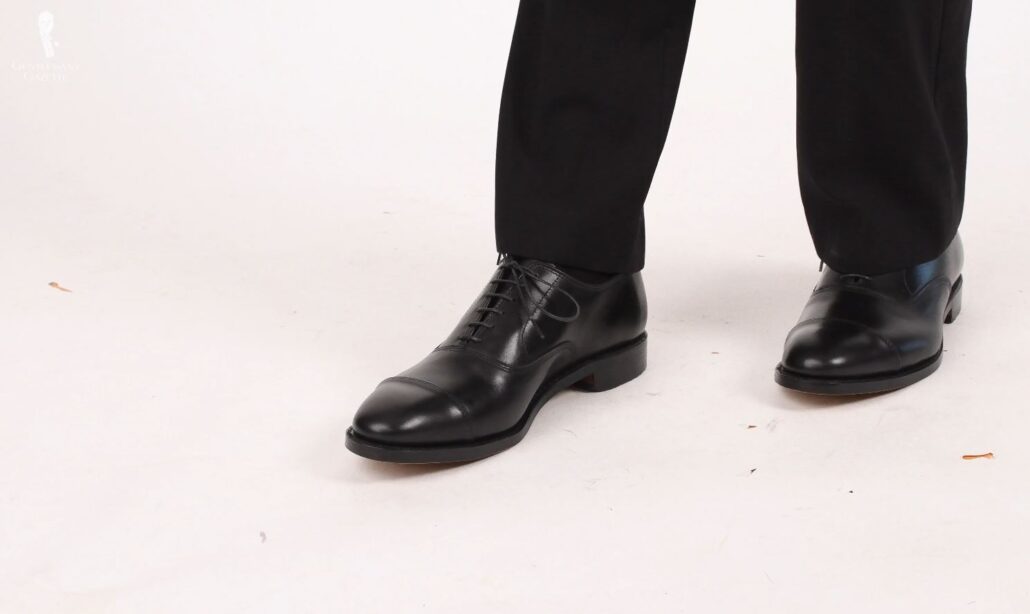 Black captoe Oxford shoes are the evolved version of vintage lace-up boots