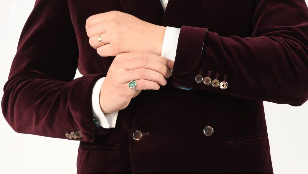 A present day jacket with four cuff buttons as worn by Raphael (Pictured: Eagle Claw Cufflinks with Malachite Balls from Fort Belvedere)