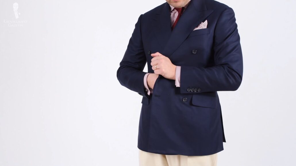 A versatile navy blazer is a staple piece in a business casual capsule wardrobe