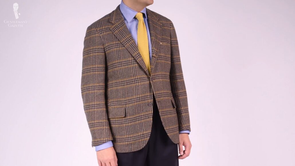 Raphael dons a Prince of Wales check sport coat with a Knit Tie in Solid Pale Yellow Silk from Fort Belvedere