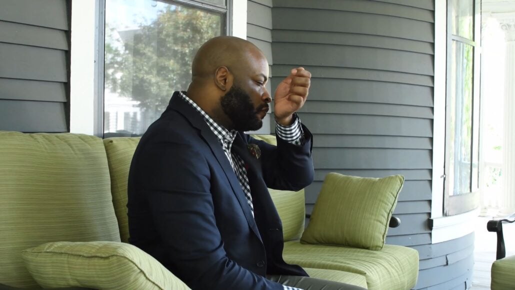 Kyle sniffs a fresh summer scent; what notes could it be? (Pictured: Moss Green Silk Wool Pocket Square with Printed geometric medallions from Fort Belvedere)