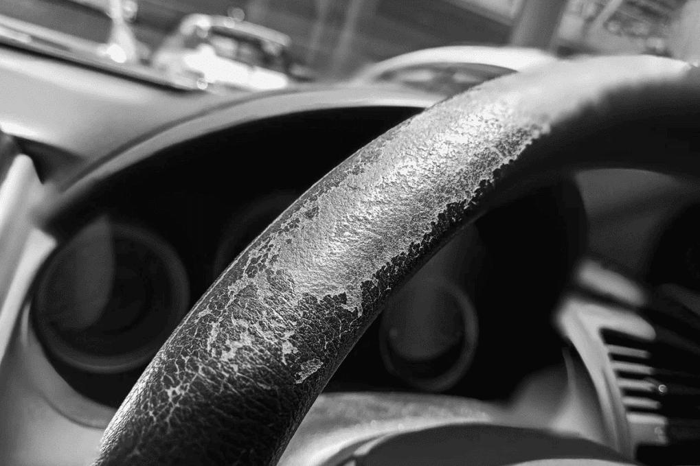 An example of the wear-and-tear damage bare hands can cause to a steering wheel. 