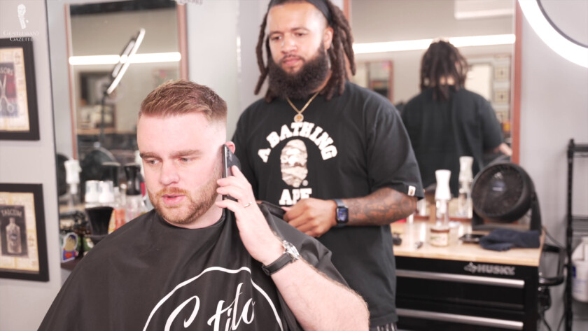 Be sensitive when taking calls during a haircut so you don't waste your barber's time.