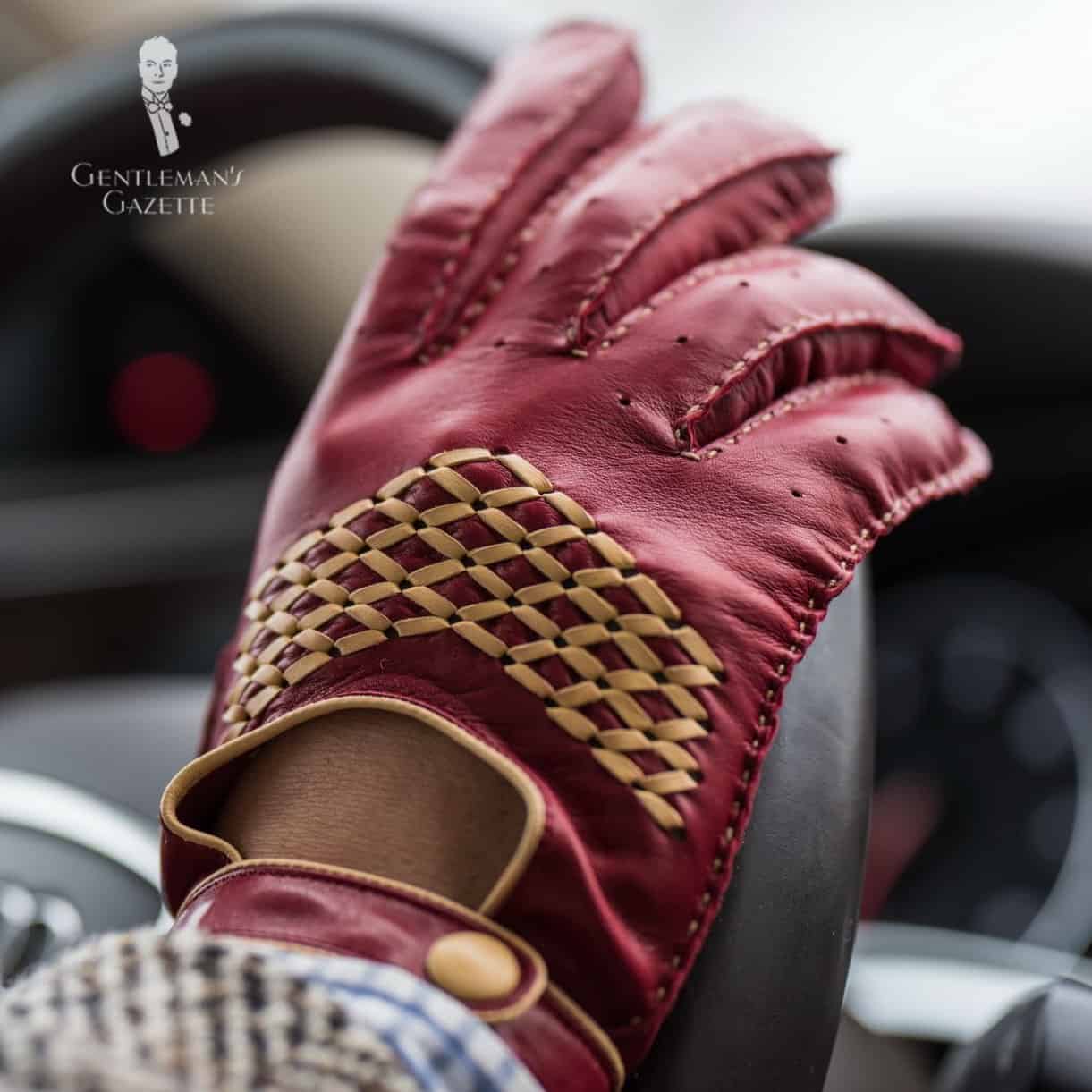 Red and sand driving gloves photo
