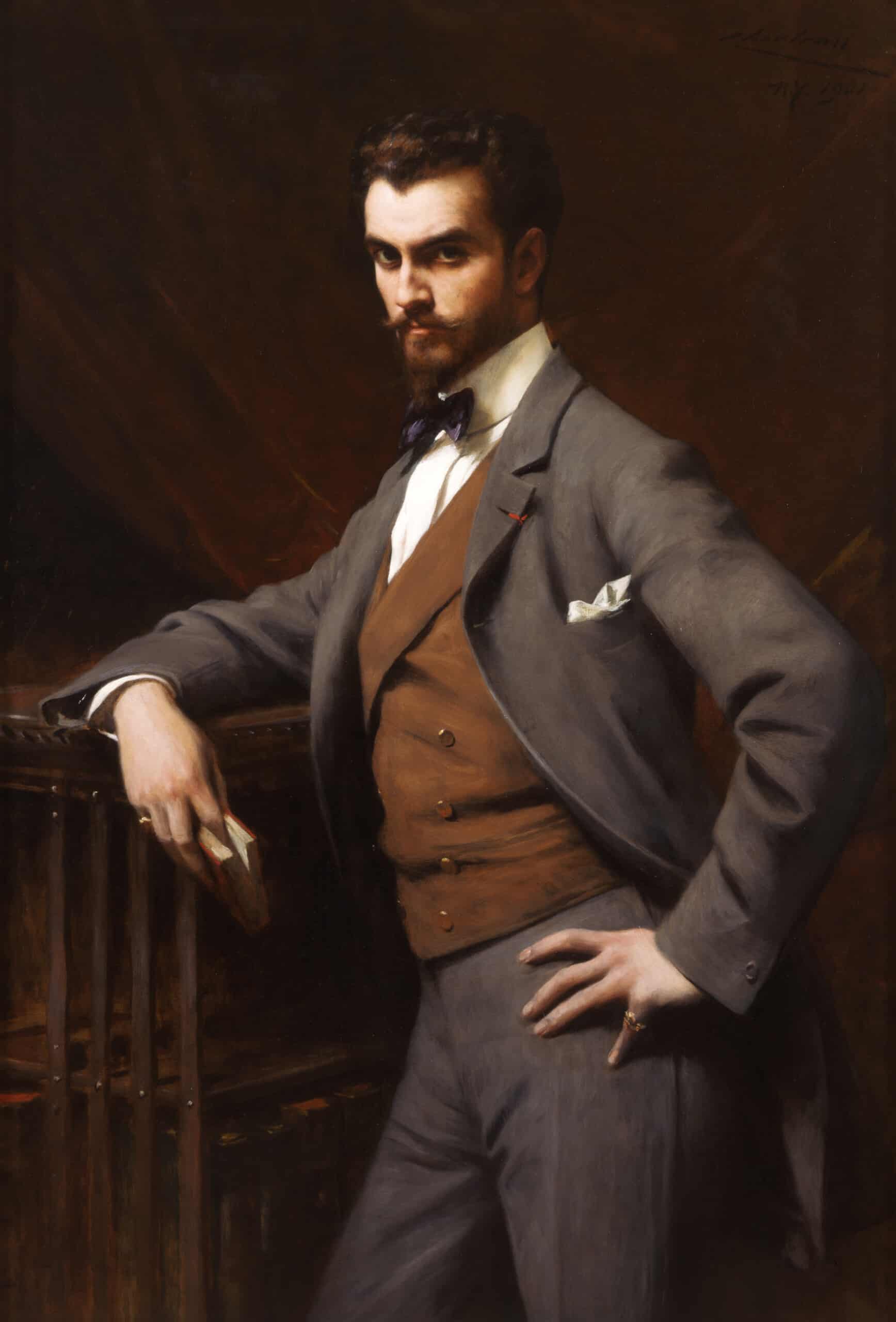 A young white man wears an expensive brown suit and pinky rings on both pinkies in this early 20th century painted portrait