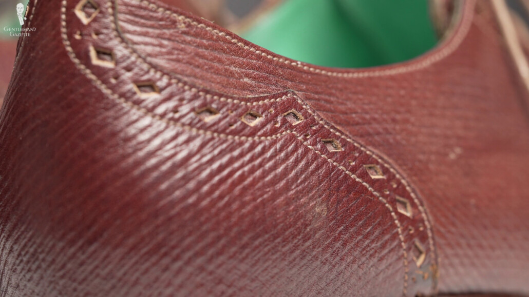 Raphael went for a heel cap design that incorporated the seam lines in the back of the shoe.