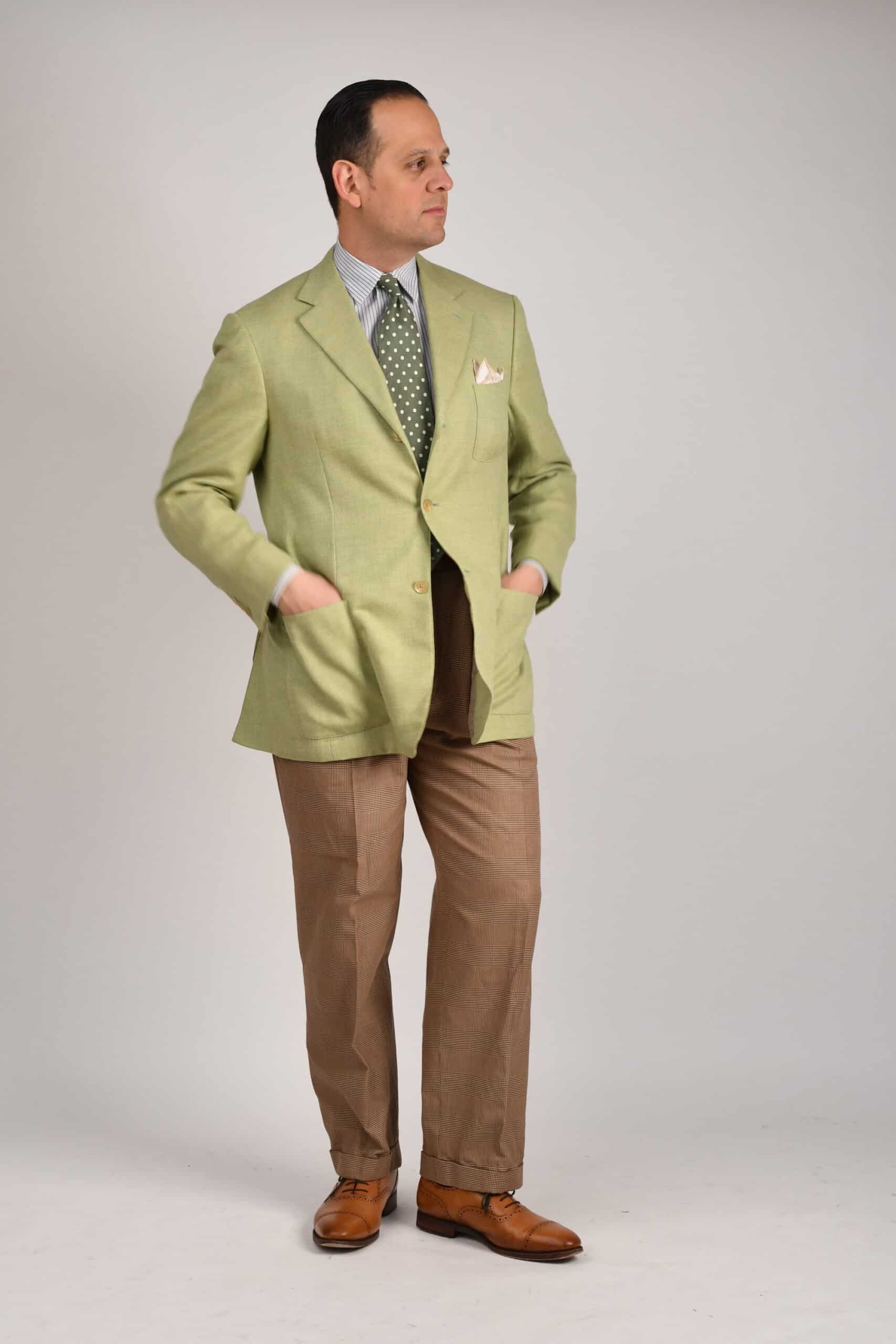 Tan Oxfords are added to an off jacket and pants combination for a semi casual look