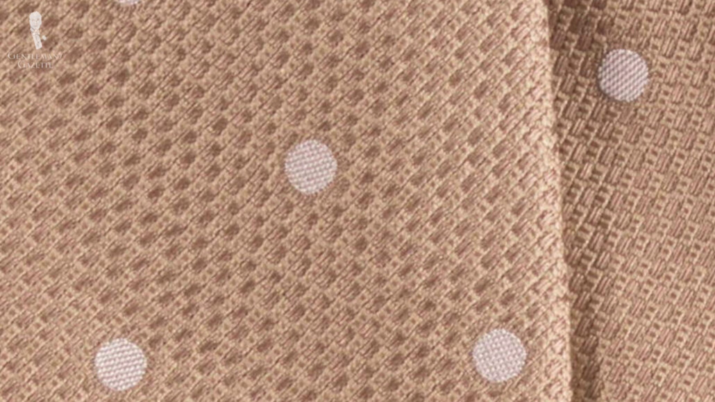 White dots are most commonly seen in menswear.