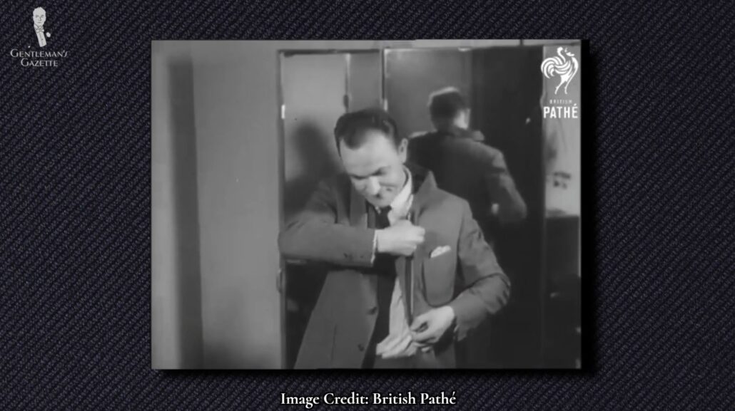 The zippered lapels of a 1960 convertible suit jacket in action [Image Credit: British Pathé]