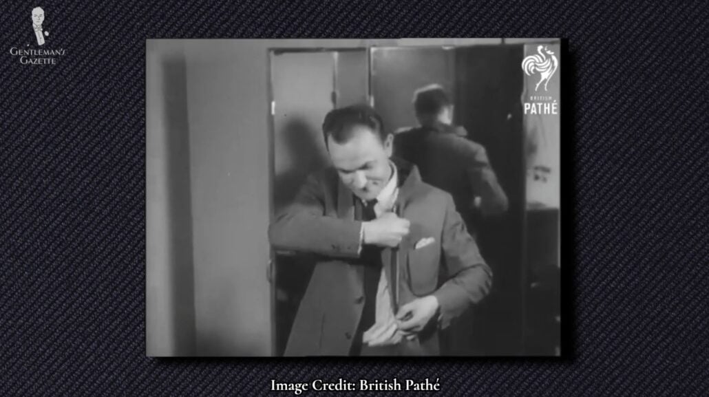 The zippered lapels of a 1960 convertible suit jacket in action [Image Credit: British Path&eacute;]