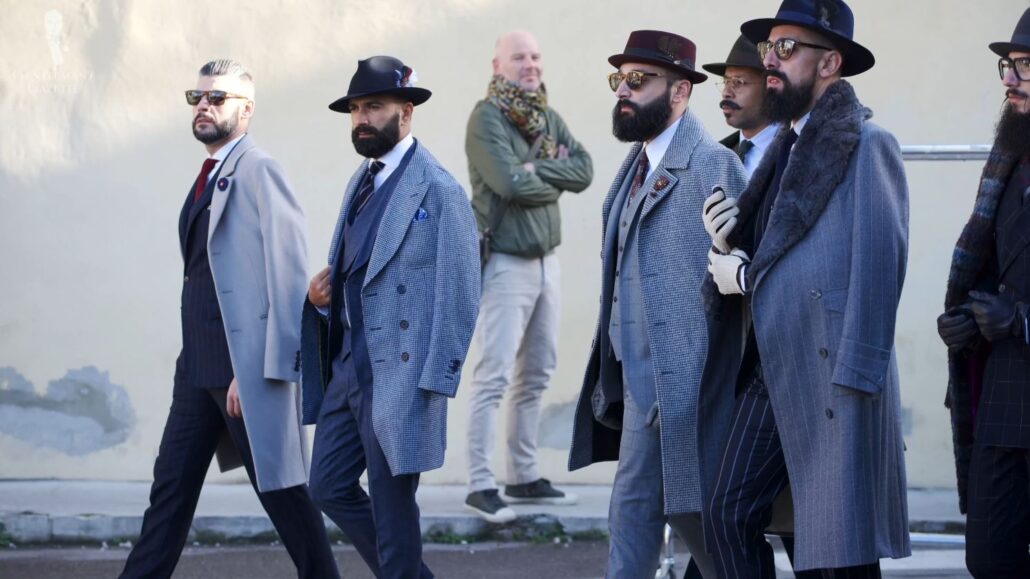A group of stylish gentlemen at Pitti Uomo
