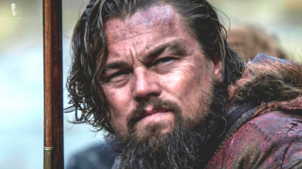 Here, he stars as Hugh Glass in The Revenant (2015) [Image Credit: 20th Century Fox]