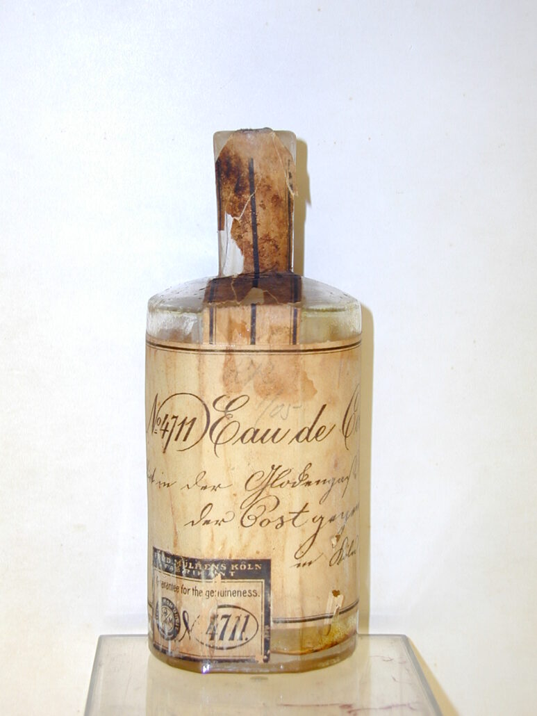 A photograph of an 1885 bottle of Eau de Cologne 4711. 