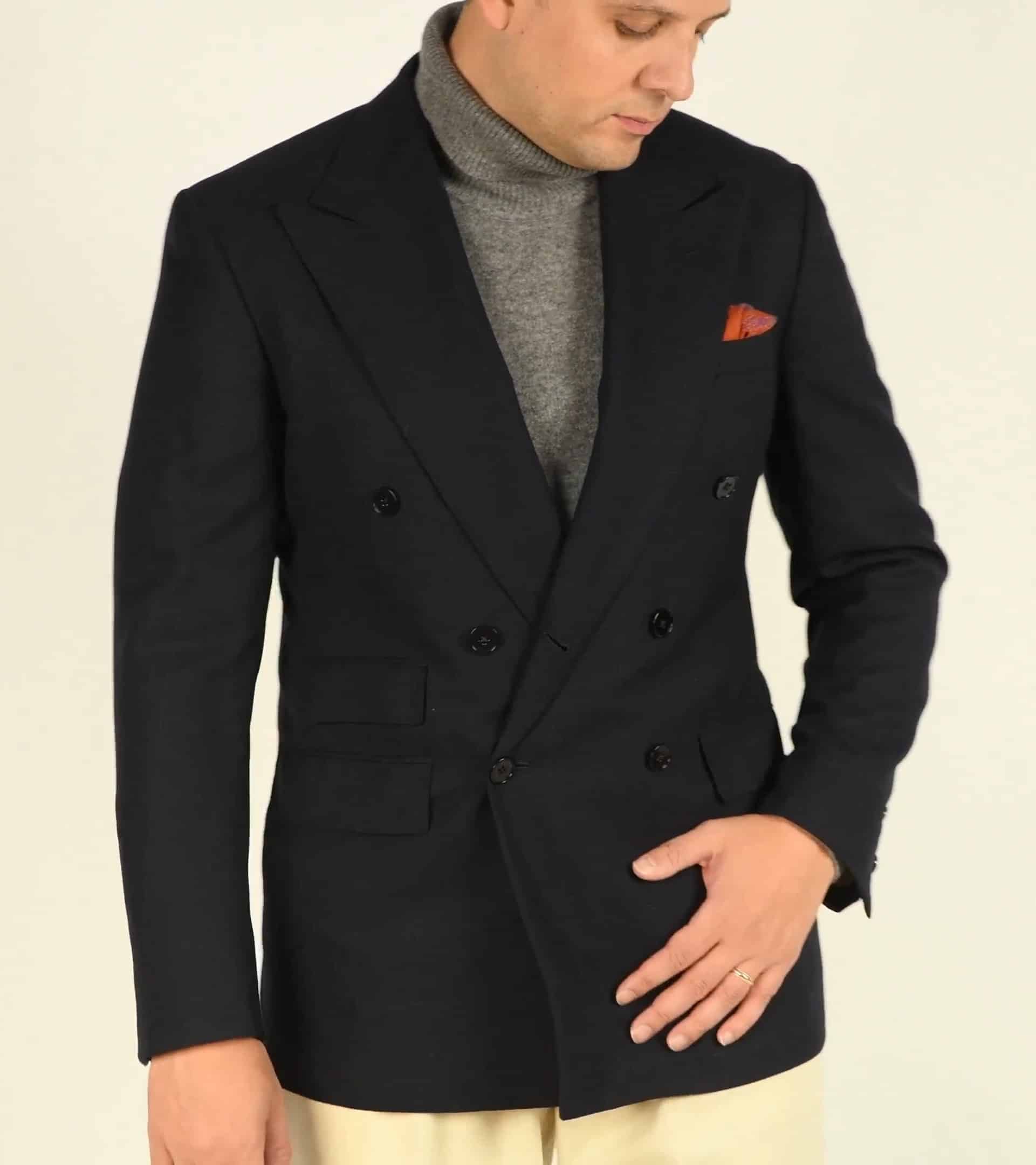 A navy jacket is a menswear staple that works wonderfully with a turtleneck