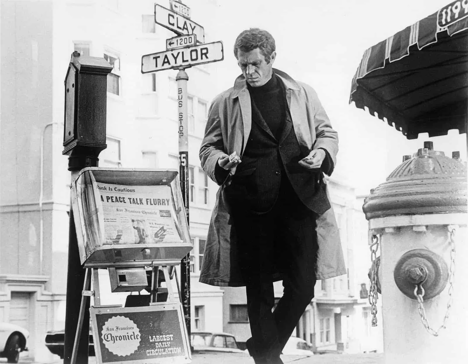 Steve McQueen wearing iconic menswear pieces including a turtleneck
