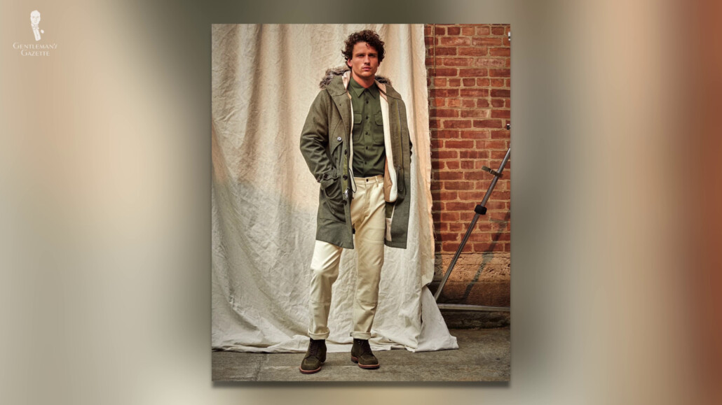 The traditional khaki green of a parka is much easier to pair with traditional menswear colors.