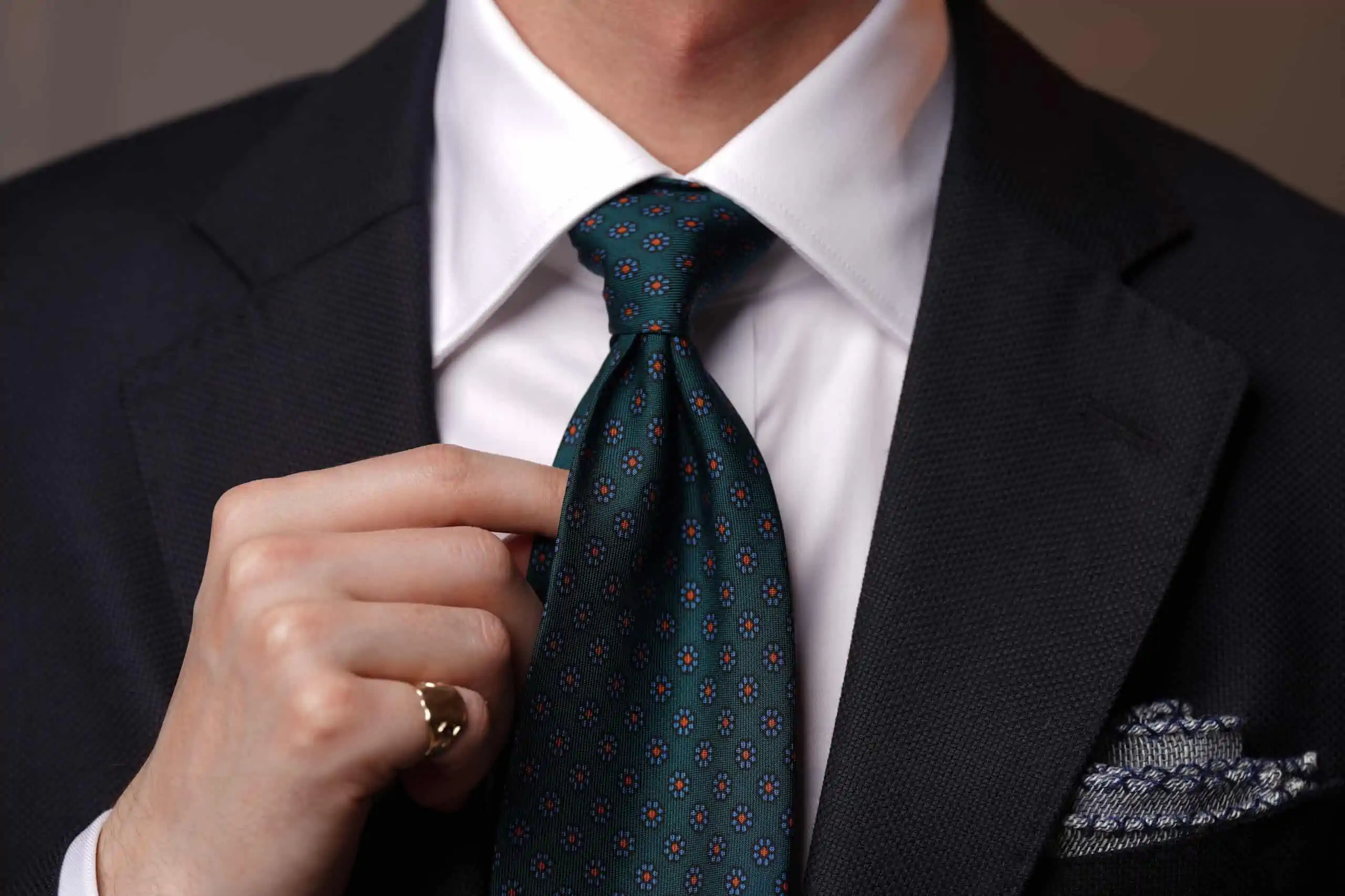 Using a slim silk tie will ensure a great Half Windsor Knot