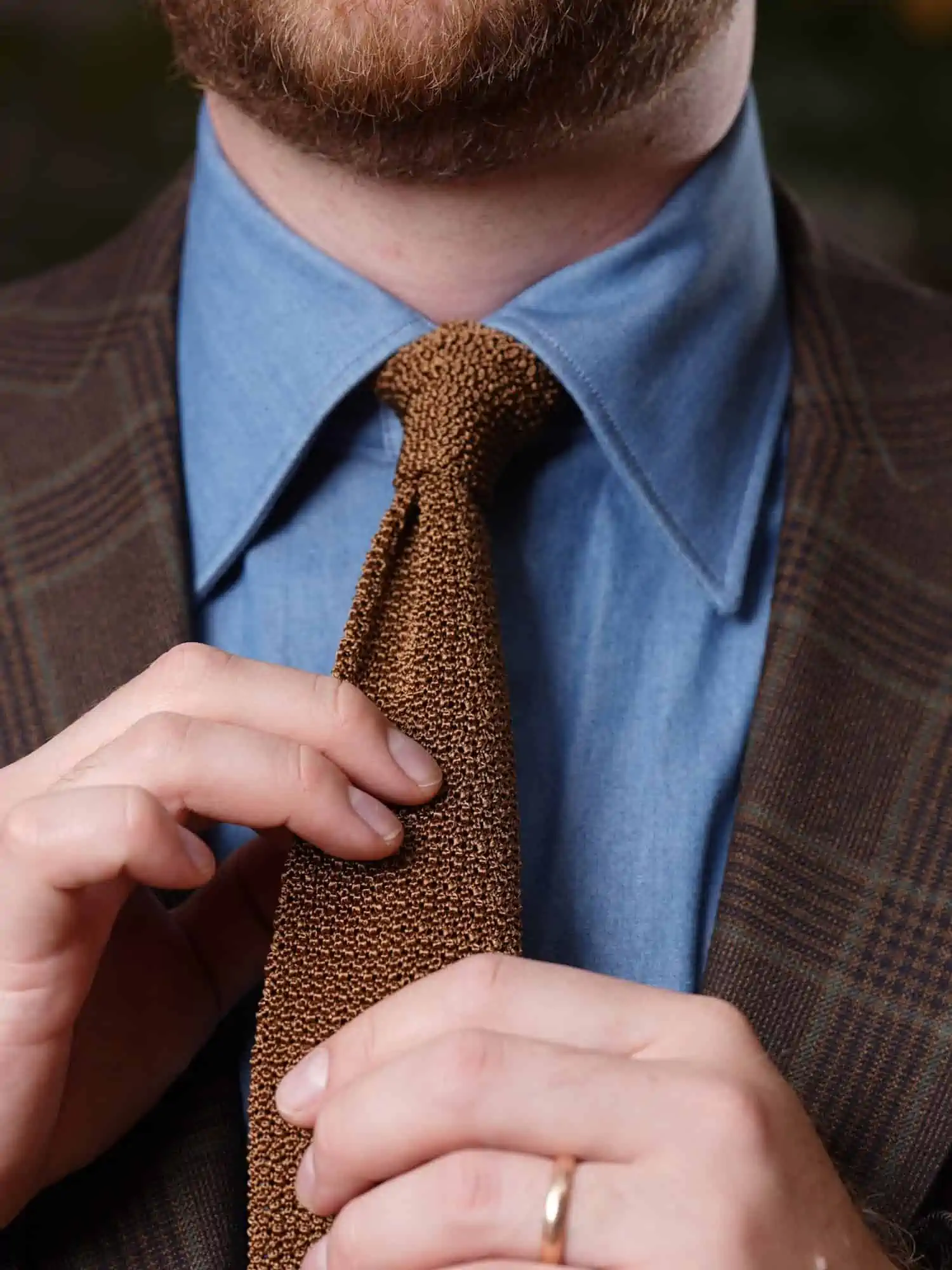 substantial ties such as knit ties require a slimmer knot than the Half Windsor Knot