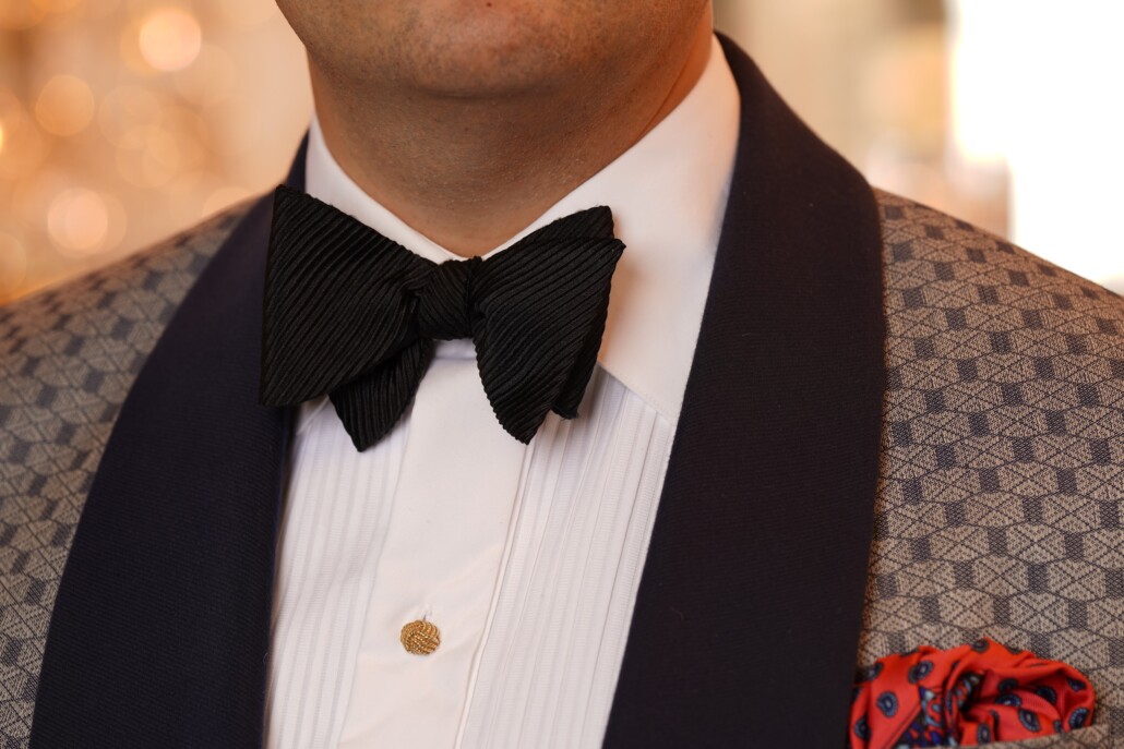 A classic spread collar on a pleated dress shirt works wonderfully for black tie events