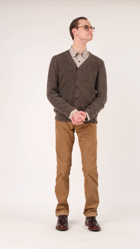 Casual outfits including a flannel shirt can benefit from knitwear such as cardigans
