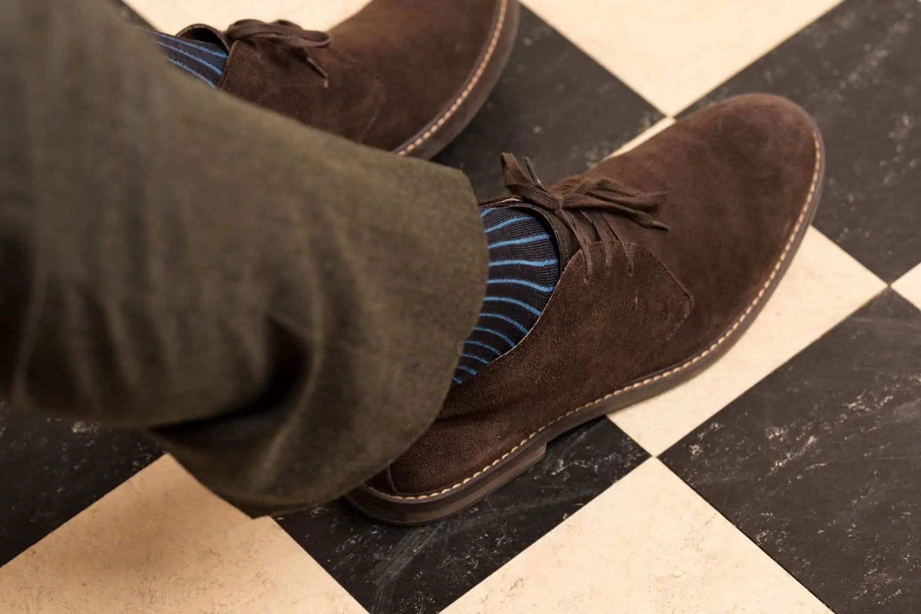 A photo of Fort Belvedere Brown and Bright Blue Socks with Suede Derbies