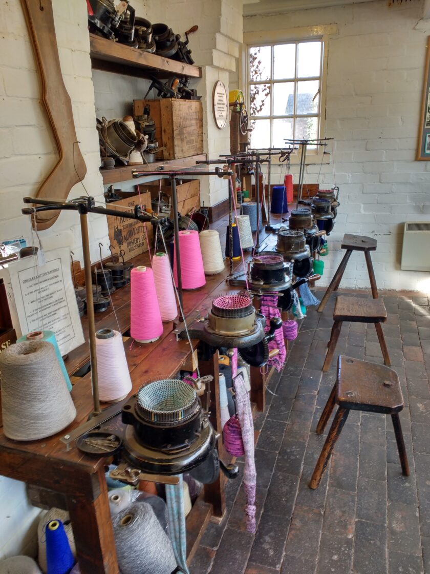 A photograph of sock knitting machines