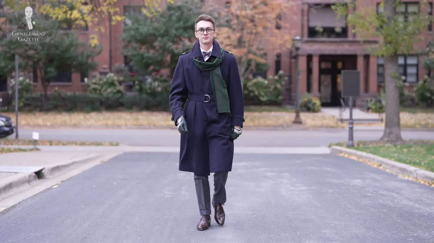 A photo of Jack wearing an overcoat for a layered winter look featuring Fort Belvedere accessories