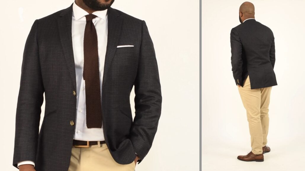 Kyle wearing an outfit with neutral and earth tones.