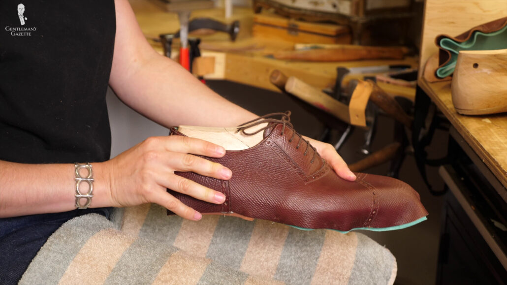 Re-lasting the shoe helps the heel cap and sideliners get into shape.