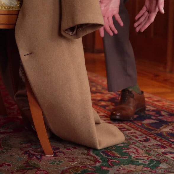 Without a proper coat rack or coat checks in restaurants, hanging overcoats over the back of a chair creates a puddle mess.