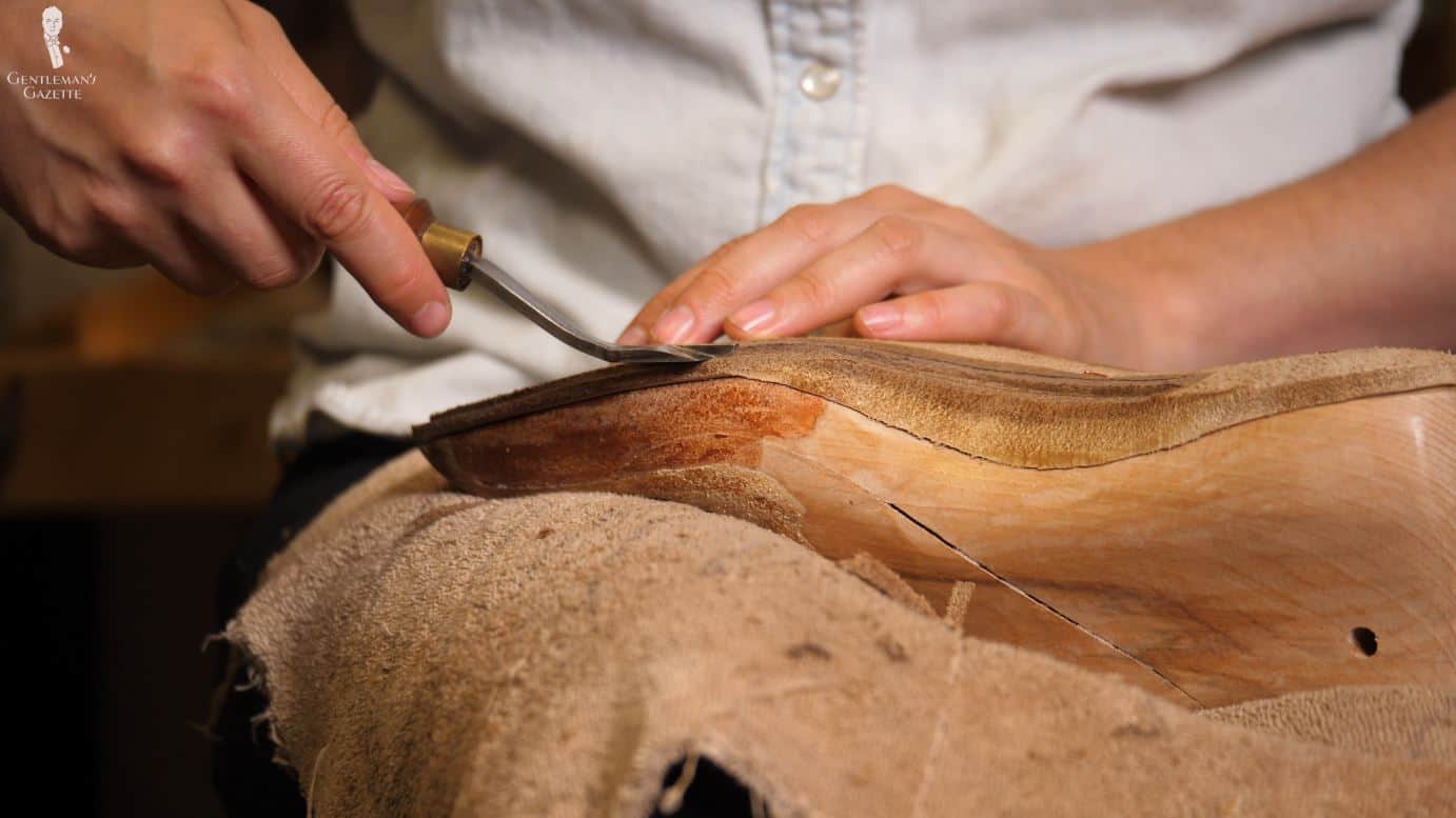 Amara uses a "welt plow" or "feathering knife" to expand the size of the channel.