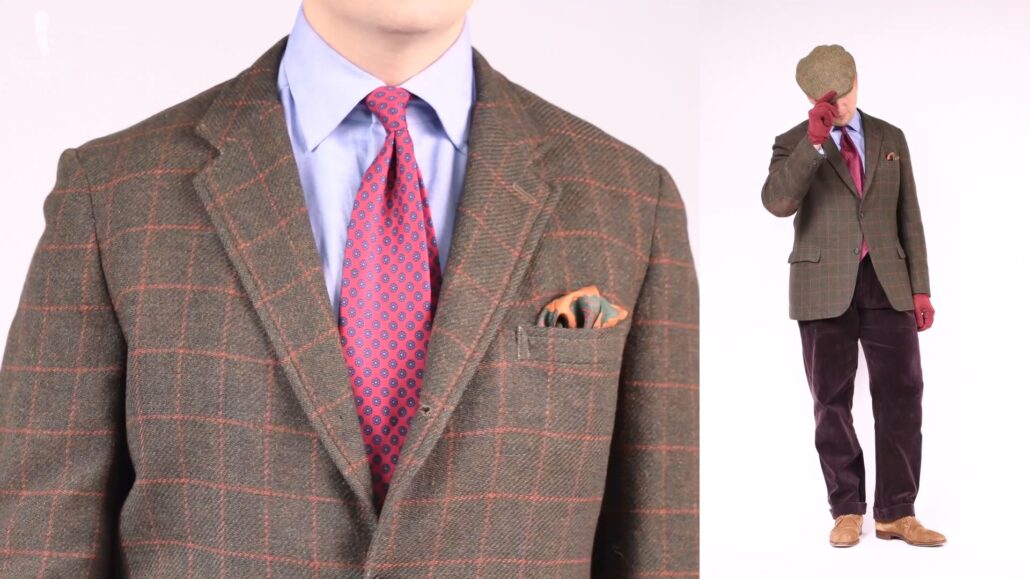The orange pocket square serves as an accent piece in this smartly combined fall-winter outfit
