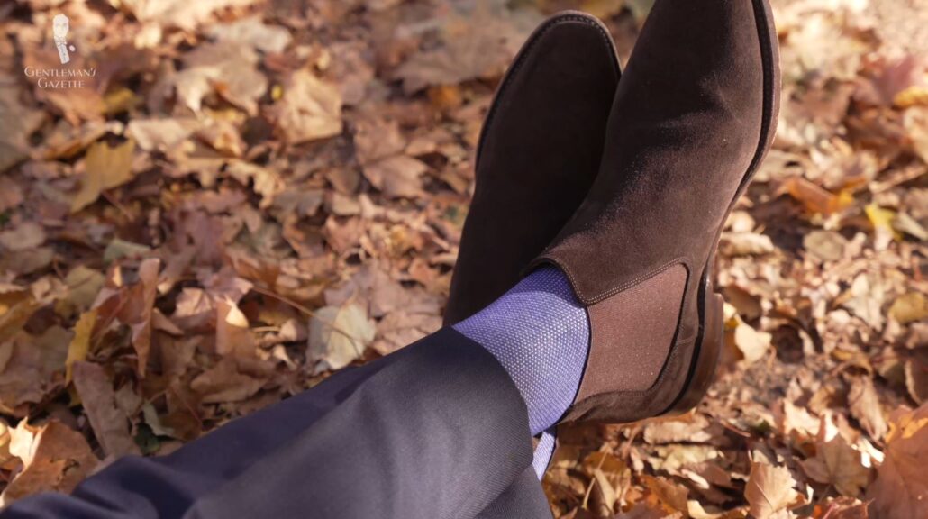 A pair of Fort Belvedere Very Blue & White Two-Tone socks adds a casual touch to the suede Chelsea boots