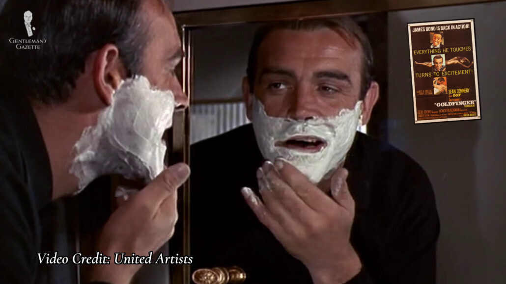 1964 "Goldfinger" - Bond applies aerosolized shaving cream with his hand.