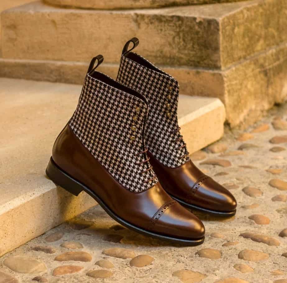A pair of Balmoral boots with a houndstooth pattern