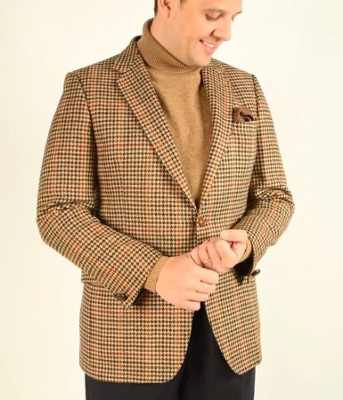 A turtleneck sweater can be a great addition to an outfit with a houndstooth sport coat