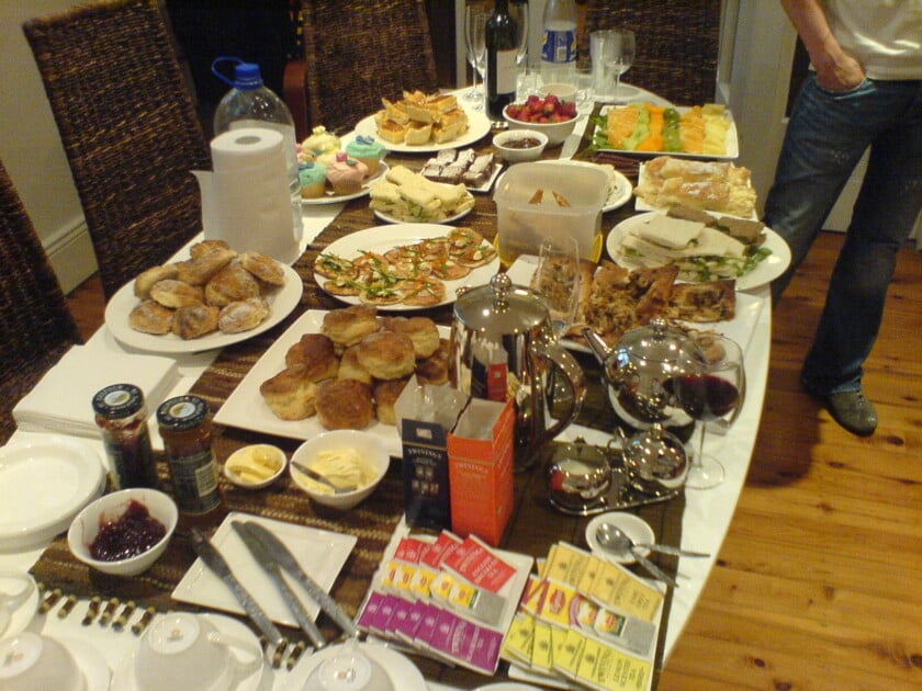 Buffer Table Via Wikimedia A photograph of food laid out on a table