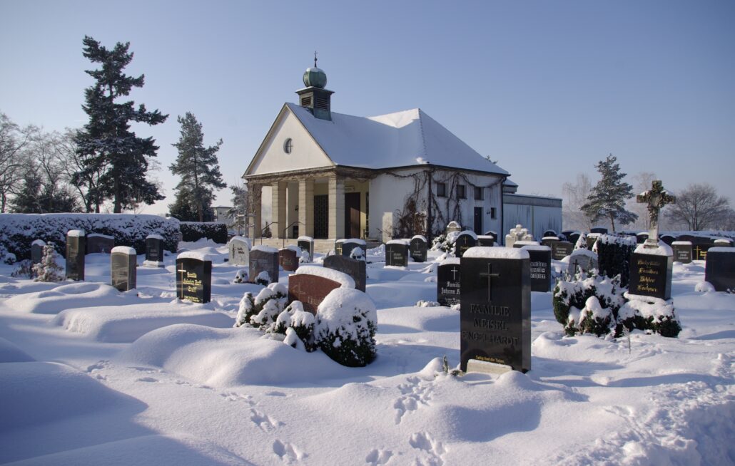 Photo of a snowy German cemetery
