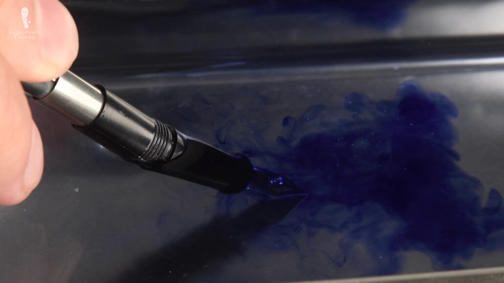 The removal of the ink stain will depend if the ink is water soluble or not.