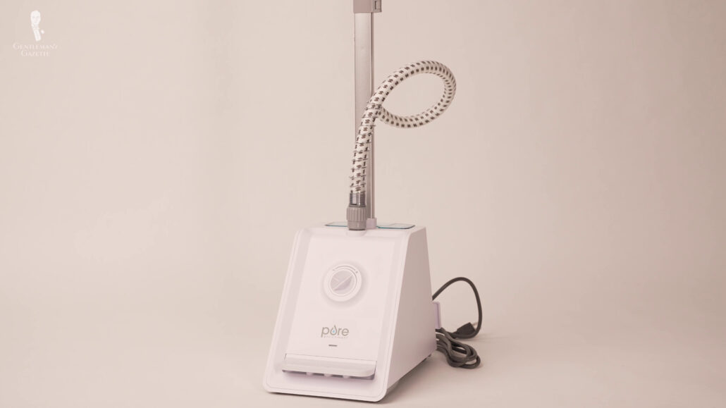 A full-sized garment steamer that comes with a water tank.