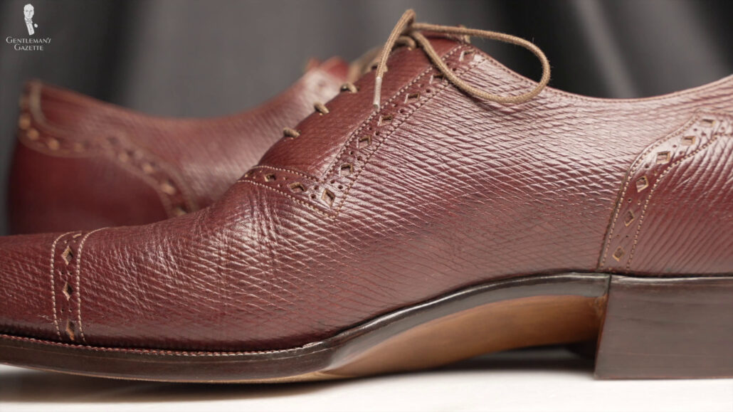 Detailed angle for the brown leather shoe heel.