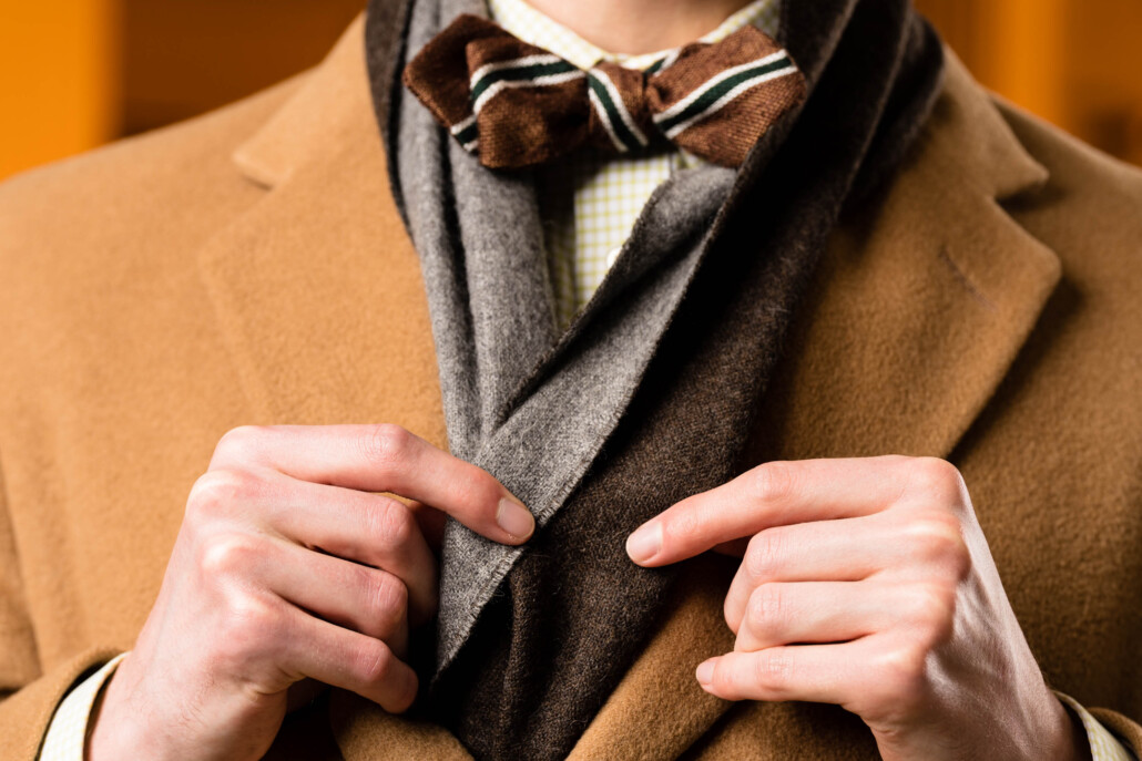 A close up photo of a bow tie and scarf