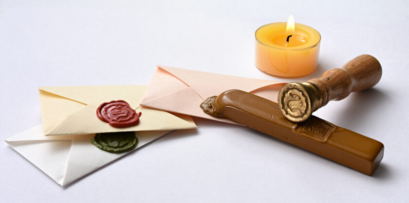 A photo of letters, seals, and sealing wax