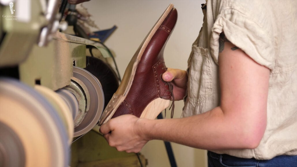 The Second Layer Is Flattened And Treated In Preparation For The Third Layer Amara flattened and treated the seond layer of the heel in preparation for the third layer.