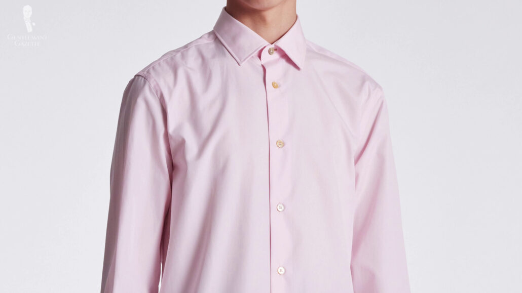 Solid color in a pink shirt made with high quality of fabric.