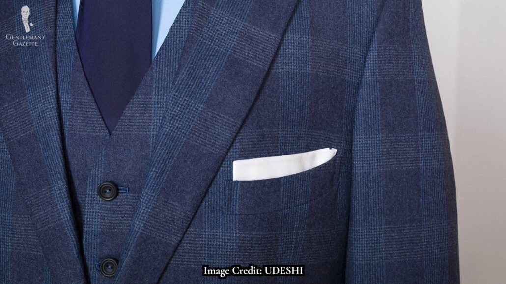 Two buttons narrow notch lapel jacket with a breast pocket has our curved barchetta.