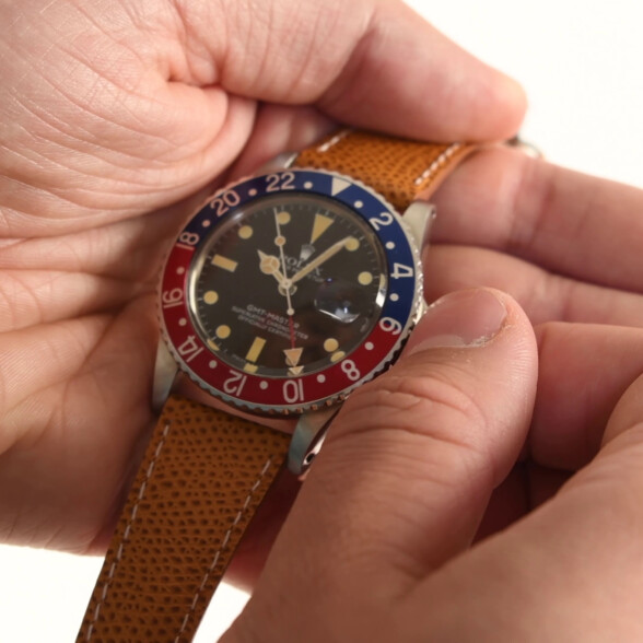 Raphael tunning a Rolex watch.